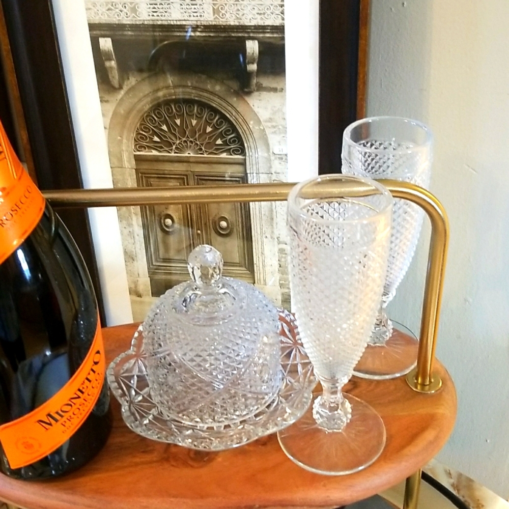 champagne flutes and a crystal candy dish